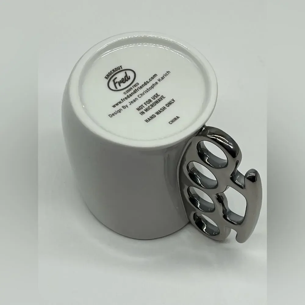 Brass knuckles coffee mug white and silver